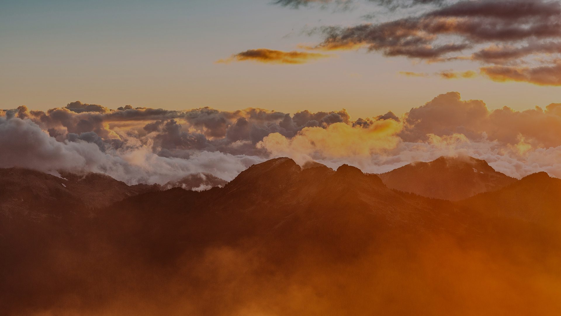 Clouds over mountain landscape